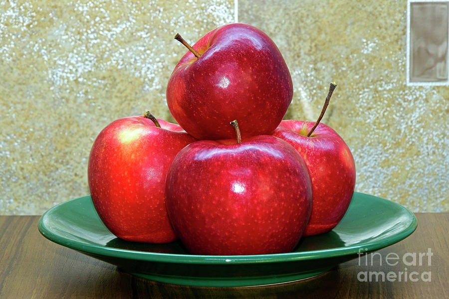 Pile of red apples on green plate Photograph by Tibor Tivadar Kui