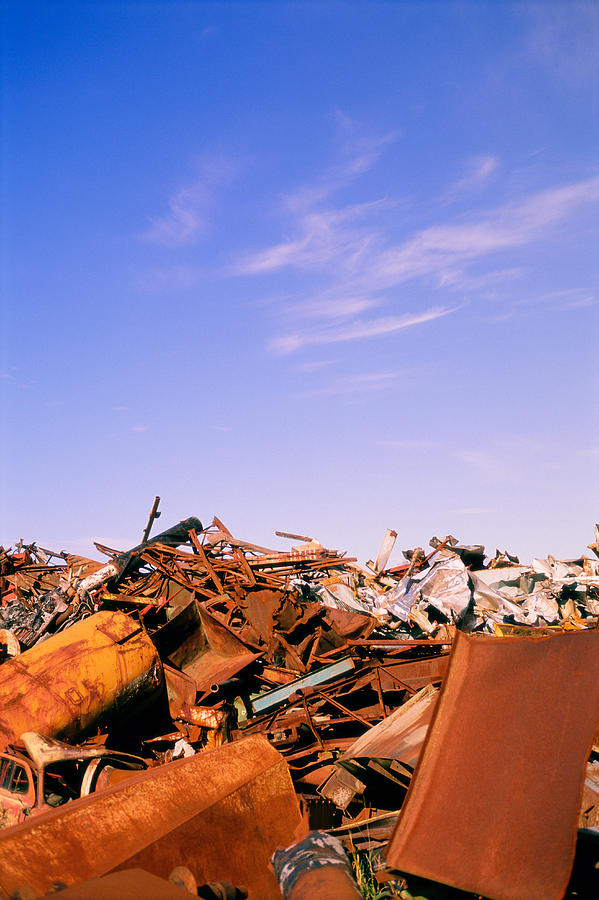Pile of scrap metal in landfill Photograph by Alan Kearney