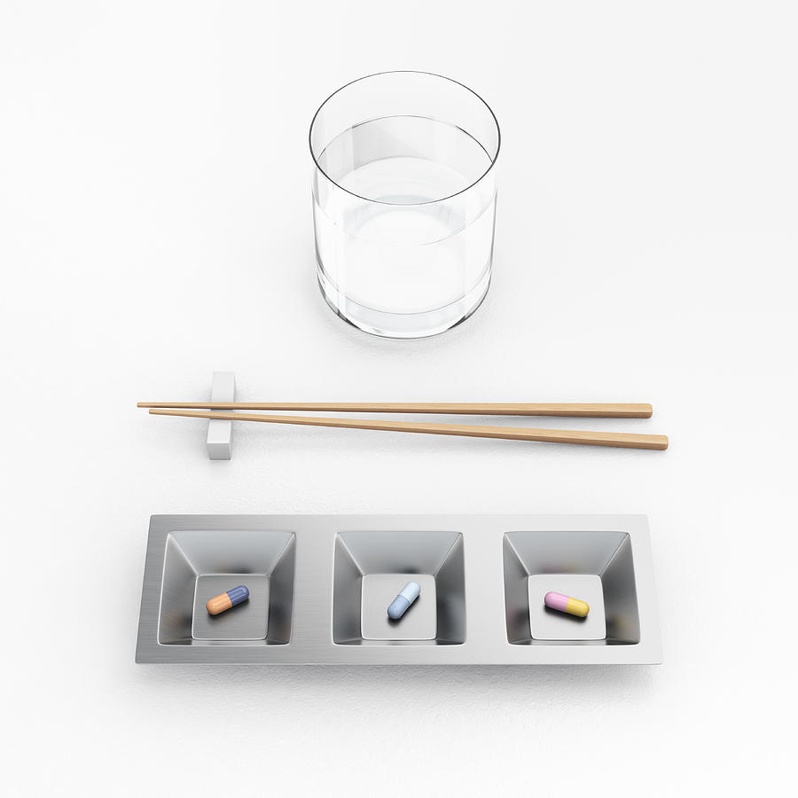 Pills / capsules arranged in a tray with chopstick Photograph by I Like That One