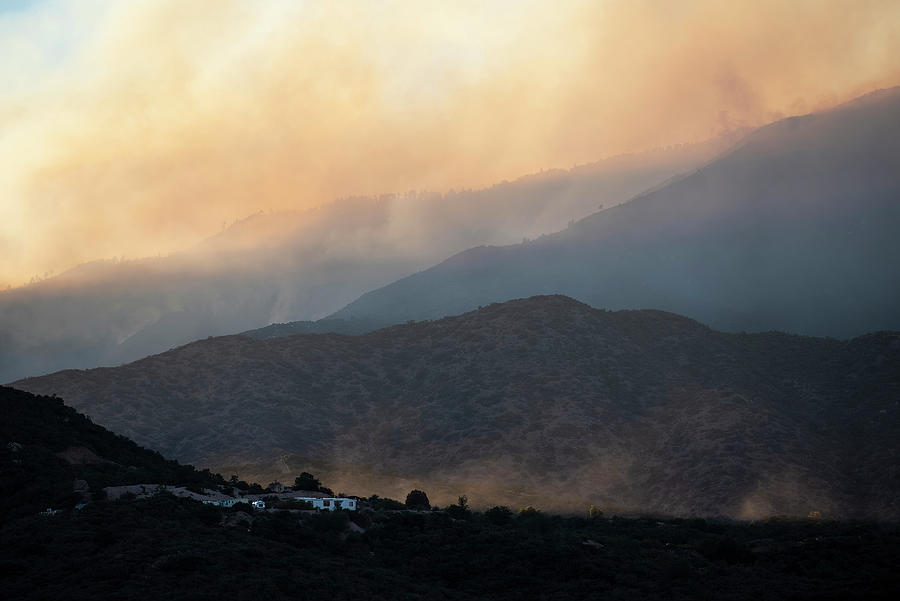 Pinal Mountains with backlit smoke Photograph by Dave Dilli