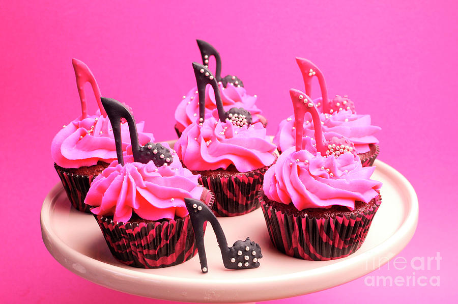 Pink and purple cupcakes Photograph by Milleflore Images