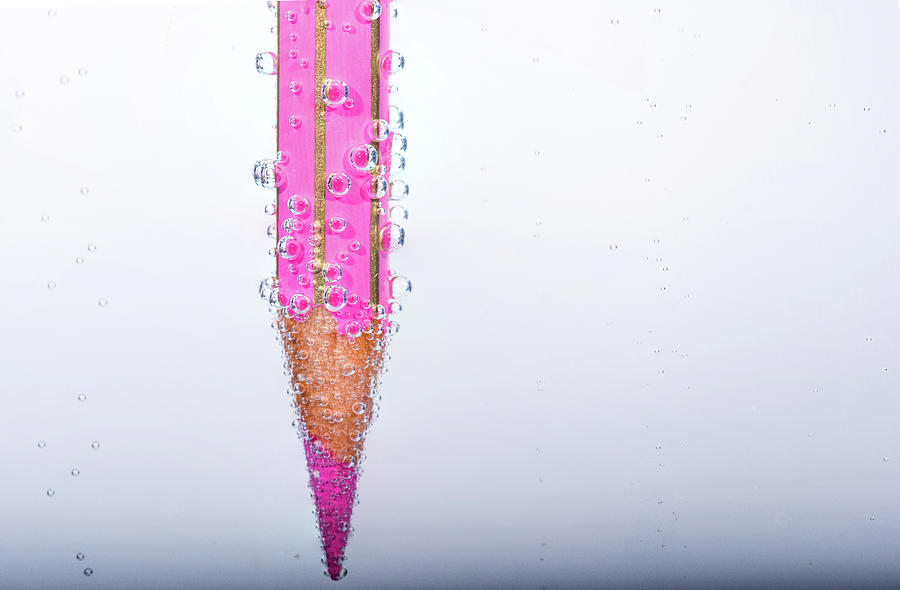 Abstract Photograph - Pink pencil in bubbly sparkling water by Gea Gaetani