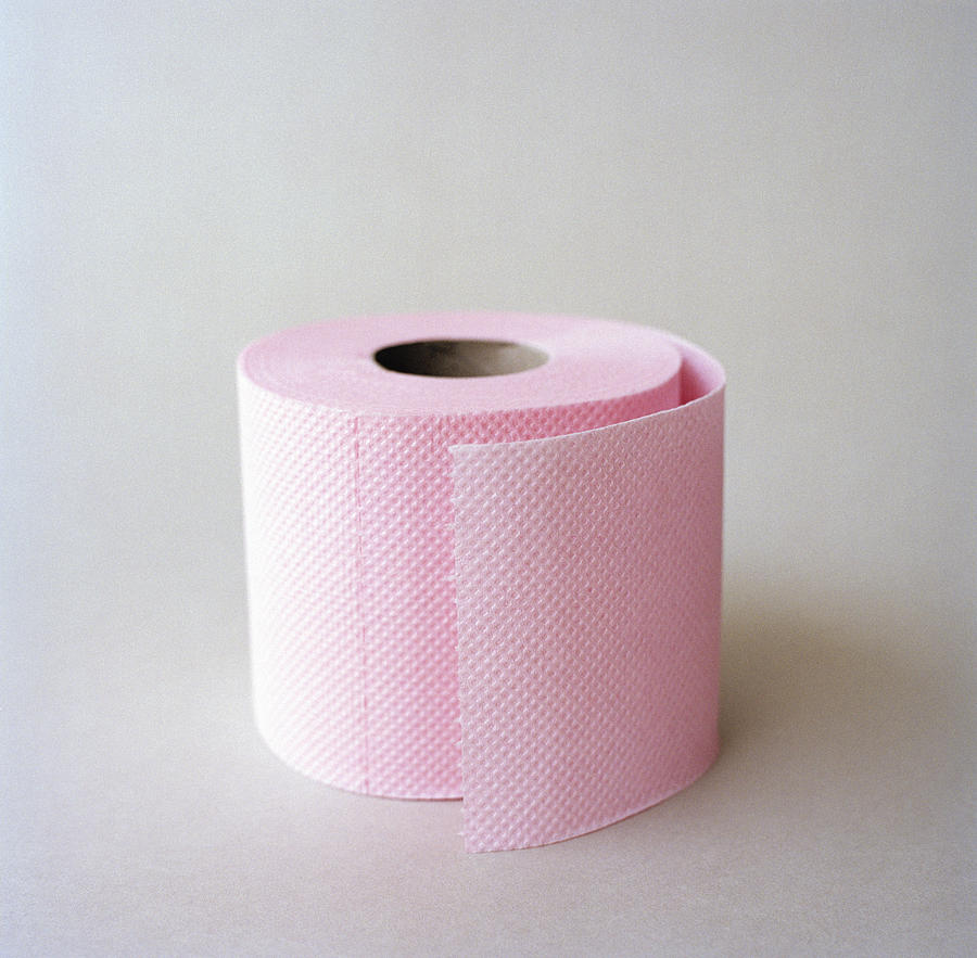 Pink toilet paper on a grey background. Photograph by Johan Odmann, Johner