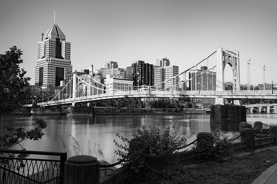 Pittsburgh Riverfront Skyline And Clemente Bridge - Black And White Photograph by Gregory Ballos Pittsburgh Riverfront Skyline And Clemente Bridge - Black And White Photograph by Gregory Ballos