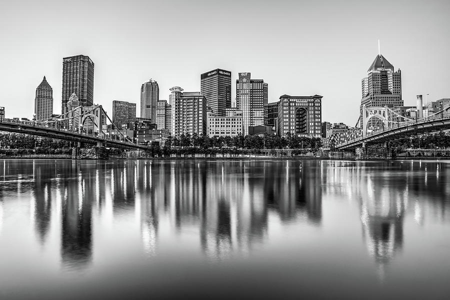 Pittsburgh Skyline Reflections On The Allegheny River - Black and White Photograph by Gregory Ballos