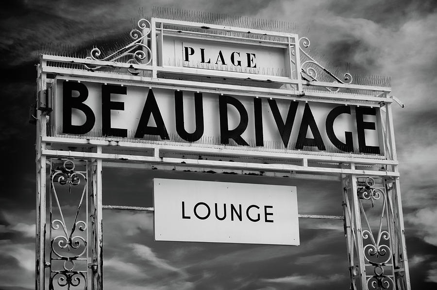 Plage Beau Rivage French Riviera Sign and Dramatic Cloudscape Nice France Black and White Photograph by Shawn OBrien