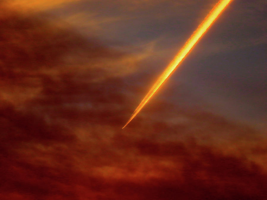 Plane Streaking Through Smoky Evening Sky Photograph by Linda Stern