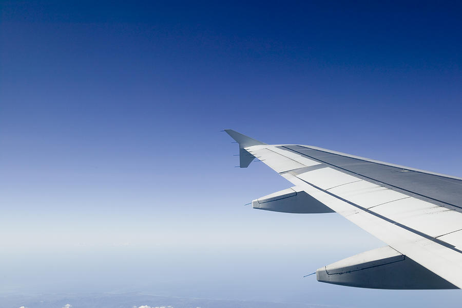 Plane wing seen from plane Photograph by Photodisc