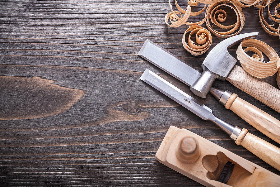 Planer claw hammer metal firmer chisels and wooden curled shavin Photograph by Mihalec