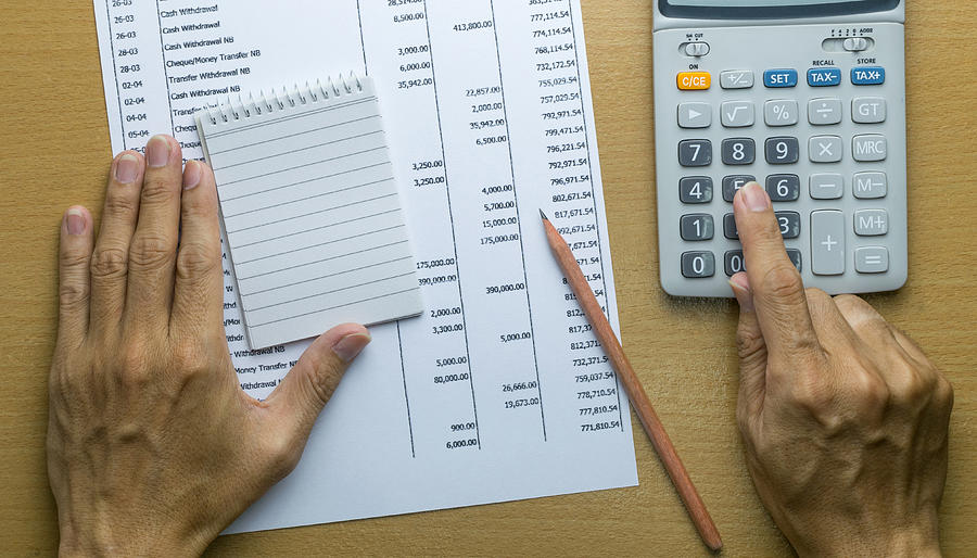 Planning monthly budget or account expenses Photograph by Zenstock