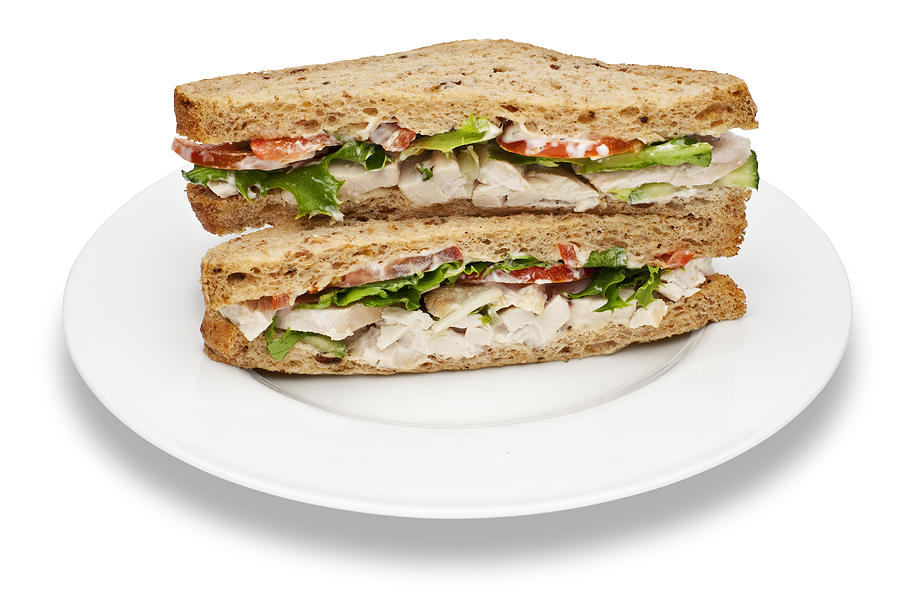 Plate of chicken salad sandwiches Photograph by Creative Crop