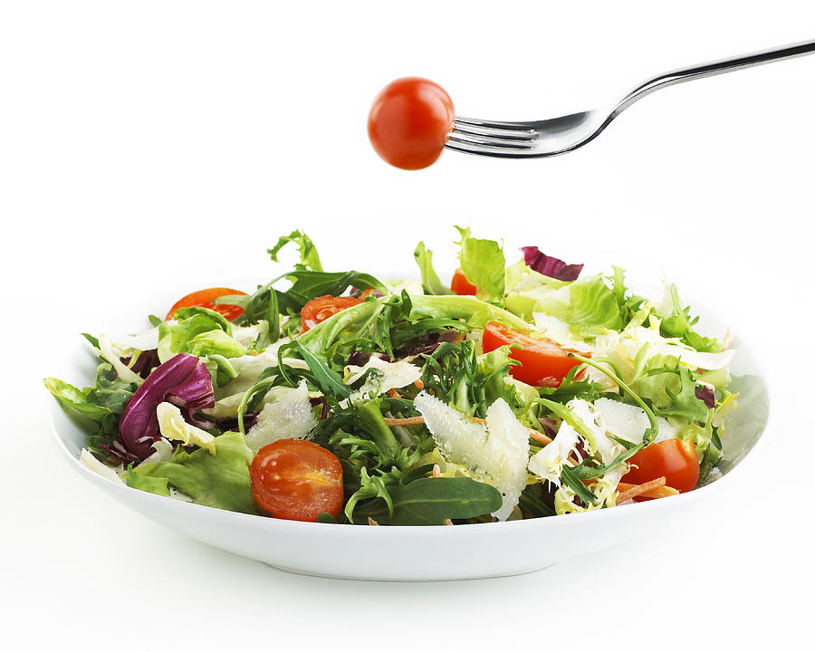 plate of Salad with fork and tomato Photograph by Esseffe
