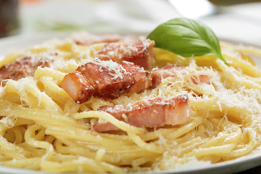 Plate with traditional Italian pasta Carbonara with grated parme Photograph by Sebastian Radu