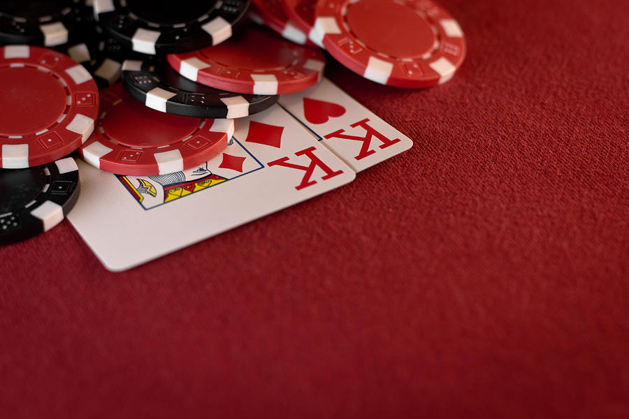 Pocket Kings with Poker Chips on Red Felt Photograph by Xccelerated