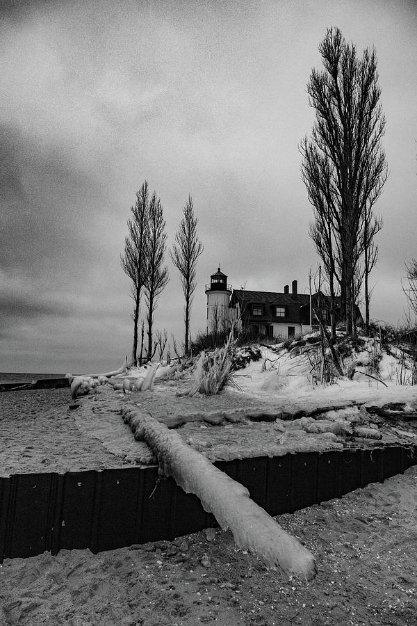 Point Betsie Lighthouse low view in winter in black and white Photograph by Eldon McGraw
