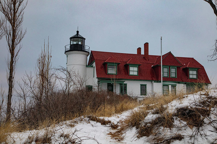 Point Betsie Lighthouse view with beach and snow Photograph by Eldon McGraw