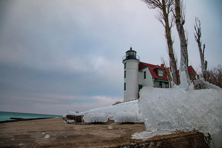 Point Betsie Lighthouse with ice view Photograph by Eldon McGraw