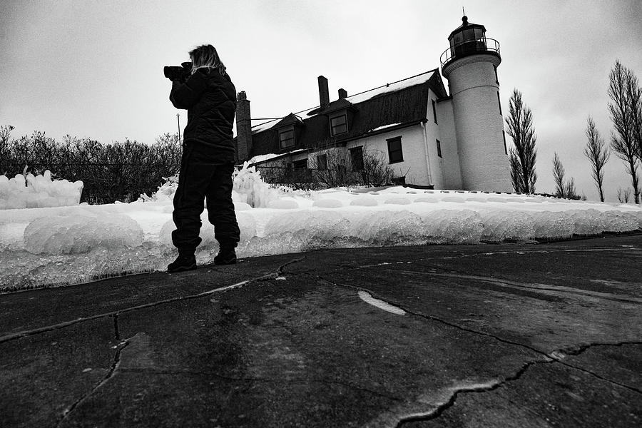 Point Betsie Lighthouse with photographer in black and white Photograph by Eldon McGraw