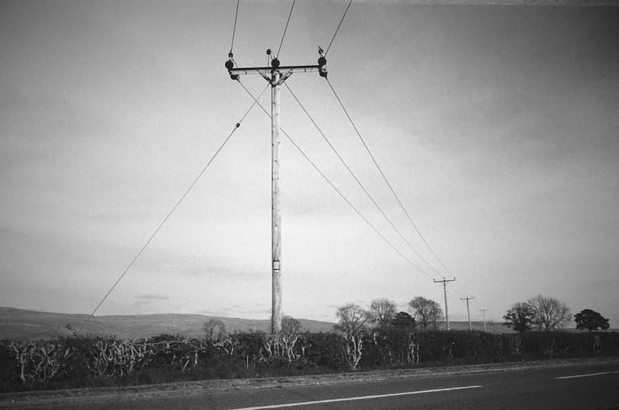 Poles Apart Photograph by Justin Farrimond