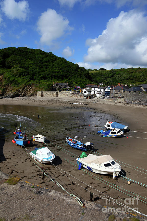 Polkerris harbour at low tide Cornwall Photograph by James Brunker