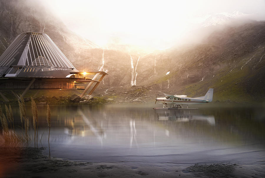 Pontoon airplane on lake near futuristic house Photograph by Colin Anderson Productions pty ltd