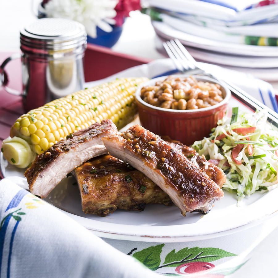 Pork rib dinner with corn and beans Photograph by Manny Rodriguez