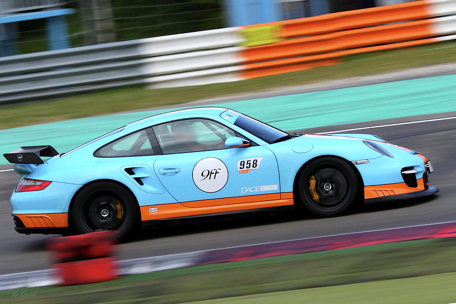 Porsche 911 on race track Photograph by Peter Kraaibeek