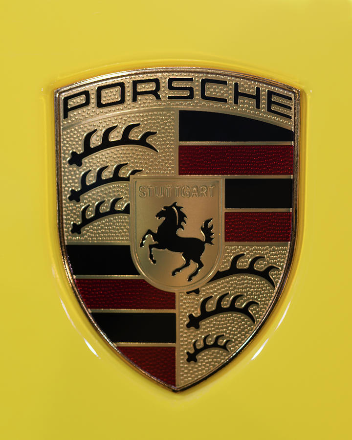 911 Photograph - Porsche Emblem on Racing Yellow by Sebastian Musial