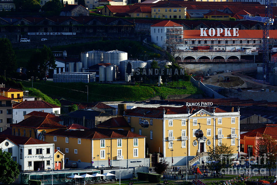Port cellars on Douro River waterfront Vila Nova de Gaia Portugal Photograph by James Brunker