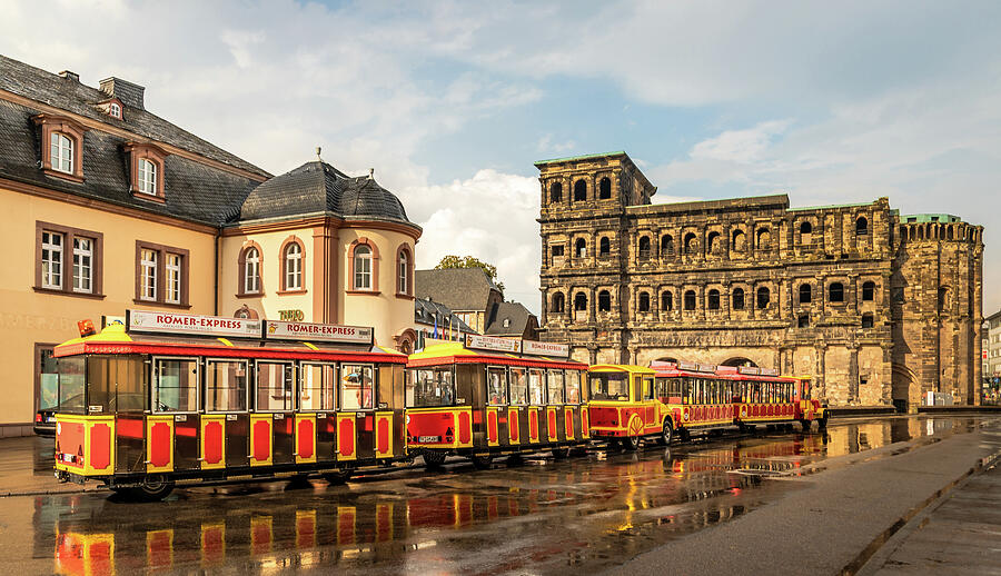 Porta Nigra and Romer Express in Trier, Germany Photograph by Elvira Peretsman