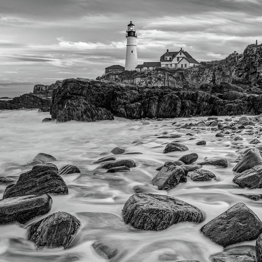 Black And White Photograph - Portland Head Light at Sunset On the Rocks - Black and White by Gregory Ballos