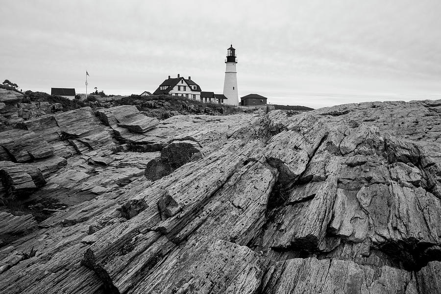 Portland Head Light Rocks Black And White Photograph by Dan Sproul