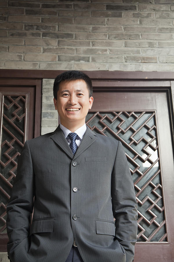 Portrait of a Businessman Photograph by XiXinXing