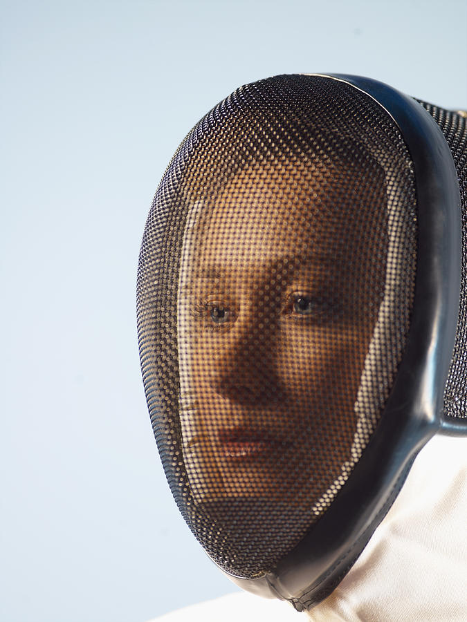 Portrait of a Female Fencer With a Mask Over Her Face Photograph by 10000 Hours
