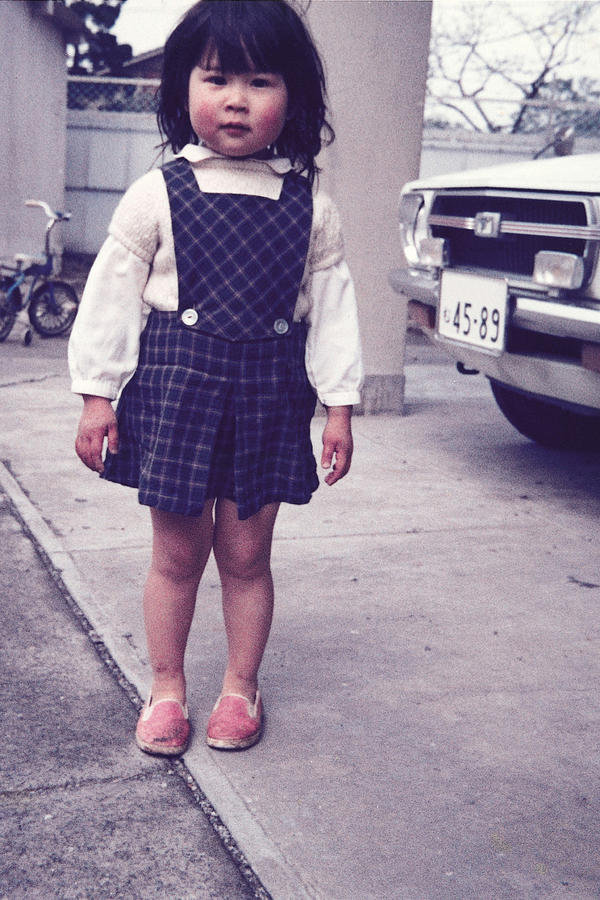 Portrait of a girl at car park Photograph by Dex Image