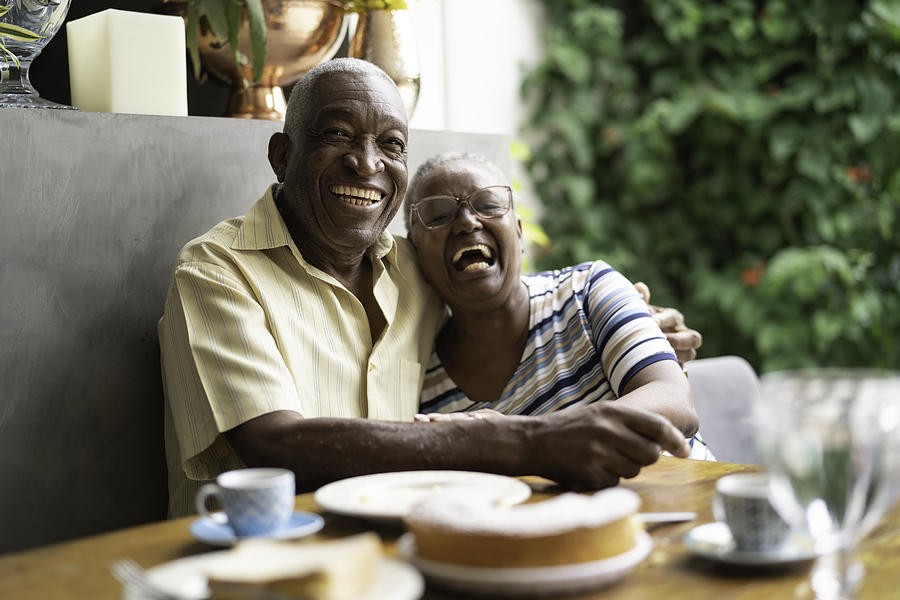 Portrait of a happy african senior couple having breakfast Photograph by FG Trade