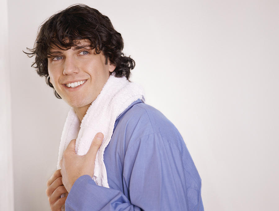 Portrait of a Happy Young Man in Pajamas, With a Towel Around His Neck Photograph by Sydney Shaffer