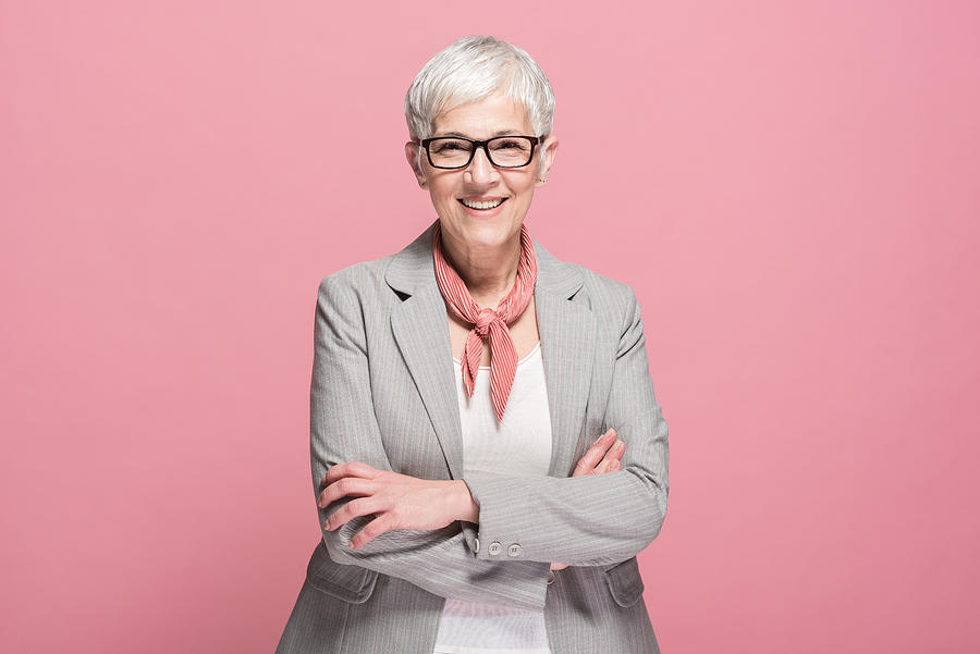 Portrait of a senior businesswoman smiling Photograph by RgStudio