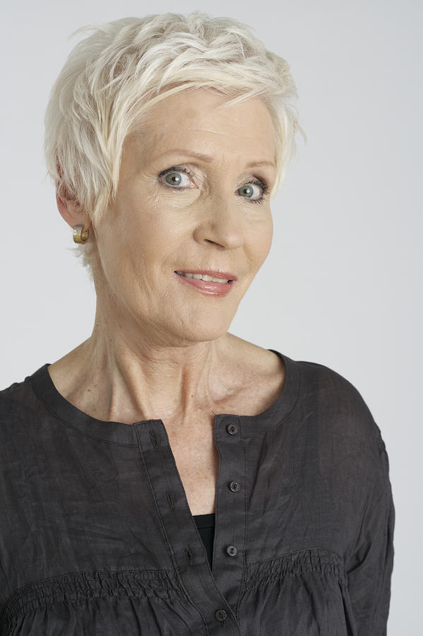 Portrait of a senior woman Photograph by Stock4b-rf