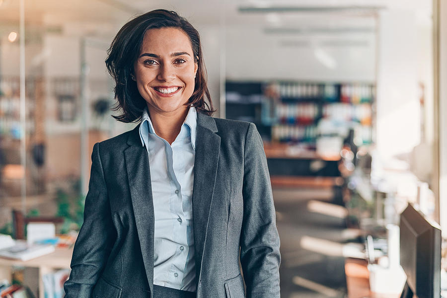 Portrait of a smiling businesswoman Photograph by Pixelfit