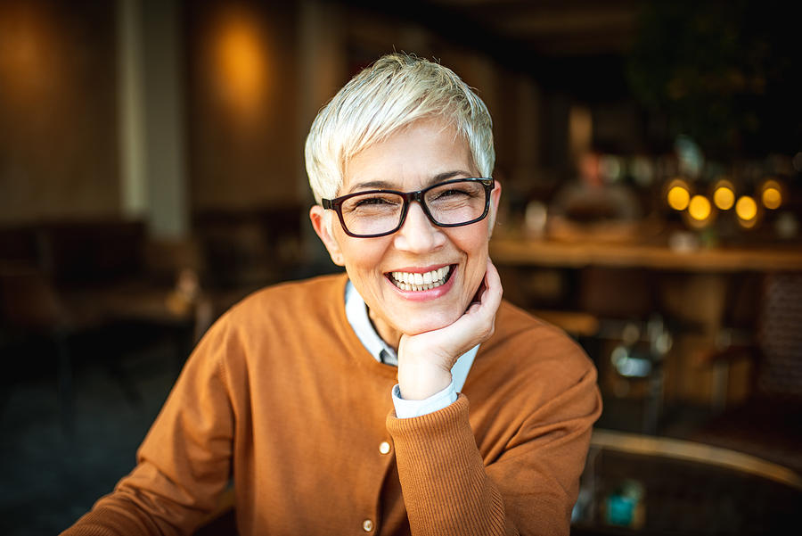 Portrait of a smiling senior woman Photograph by MStudioImages