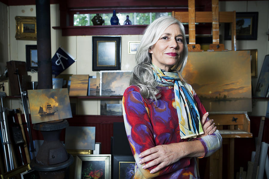 Portrait of a woman in her artist studio. Photograph by Andreas Kuehn