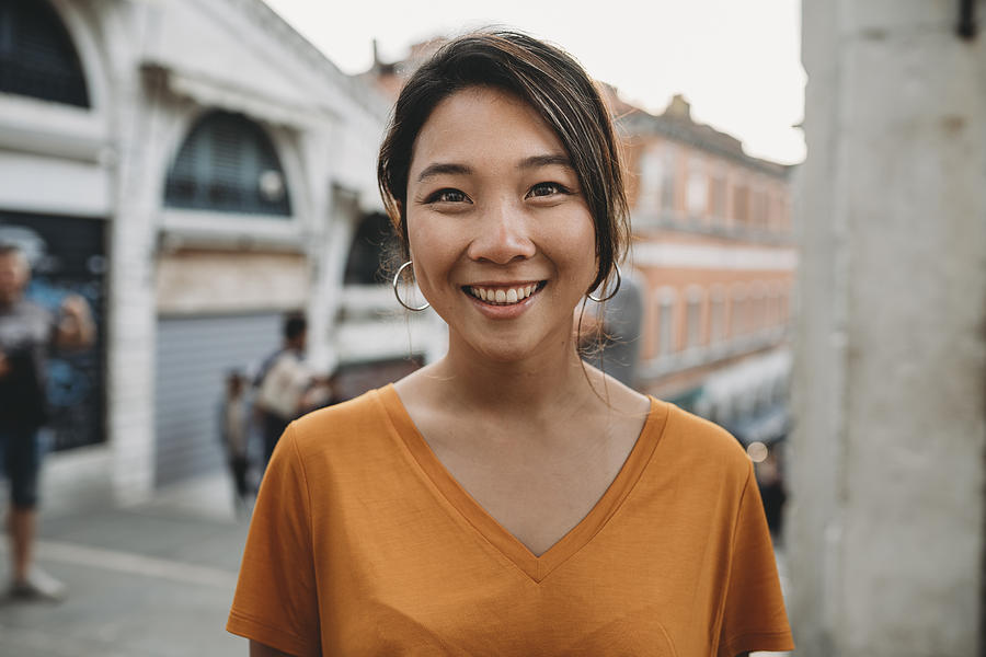 Portrait of a young adult asian woman in Venice Photograph by FilippoBacci