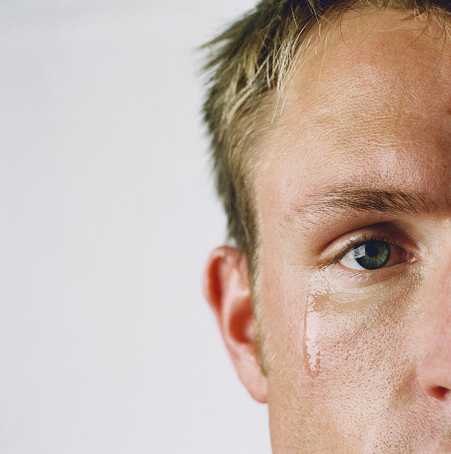 Portrait of a young man crying Photograph by Stockbyte