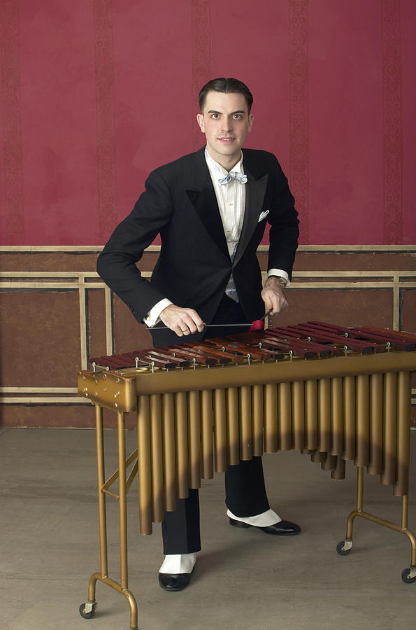 Portrait of a Young Man in an Old-Fashioned Suit Playing the Xylophone Photograph by Gregory Costanzo
