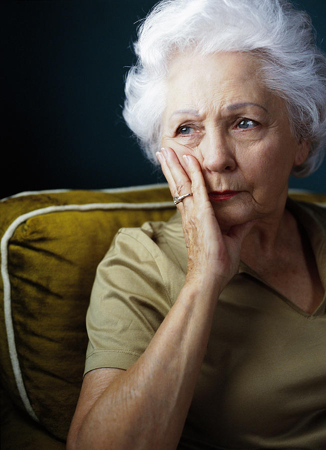 Portrait Of An Elderly Woman In A State Of Worry Photograph by Stockbyte