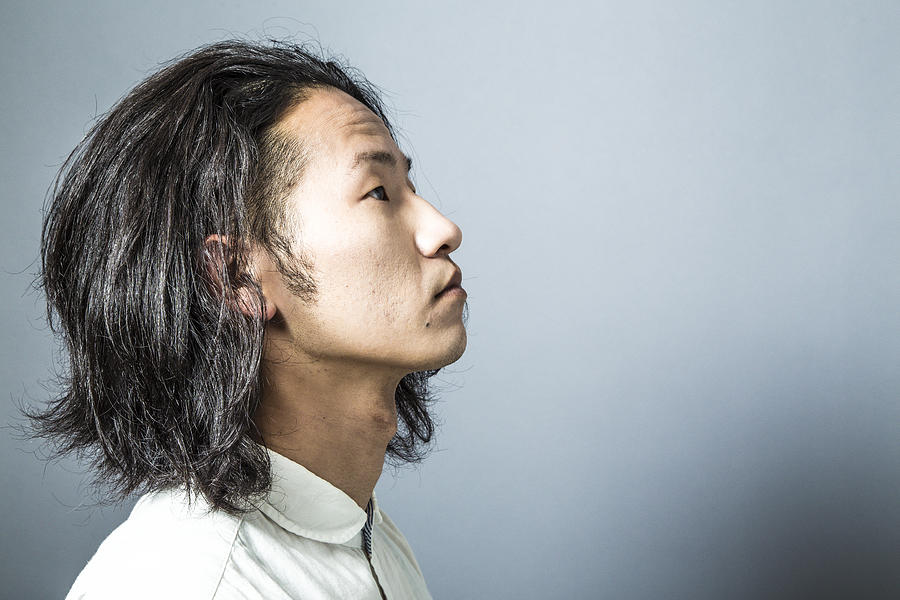 Portrait of Asian man,side view Photograph by Atsushi Yamada