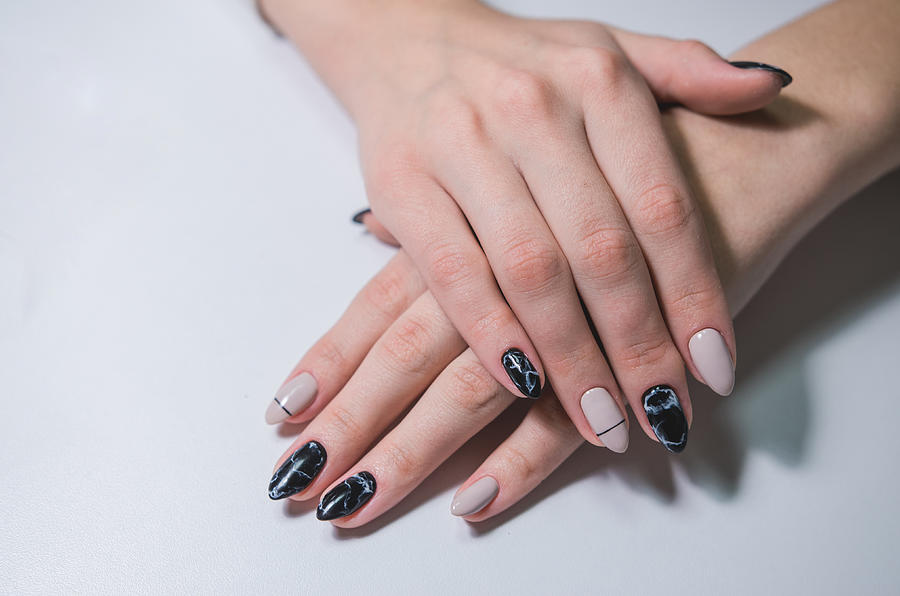 Portrait of beautiful nail art.  Black and white Photograph by Anna Volobueva