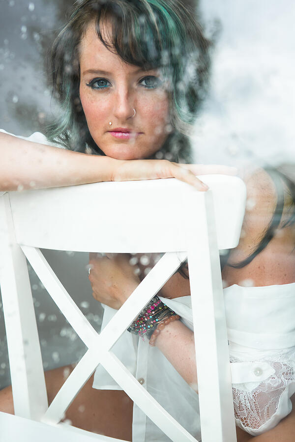 Portrait of beautiful woman leaning on chair. Photograph by ChristopherBernard