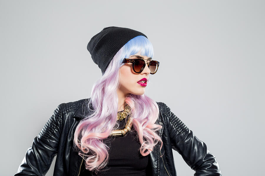 Portrait of blue-pink hair carefree girl wearing leather jacket Photograph by Izusek
